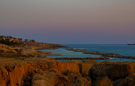 Sunset over Mediterranean sea near village Chlorakas in Cyprusの写真素材