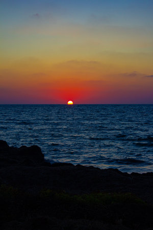 Last moment of sunset over Mediterranean sea, Cyprusの写真素材