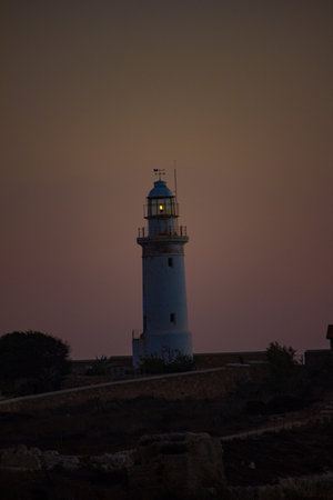 Lighthouse under sunset  in city Paphos in Cyprusの写真素材
