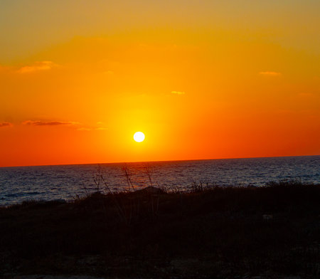 Red sunset over Mediterranean sea in Cyprusの写真素材