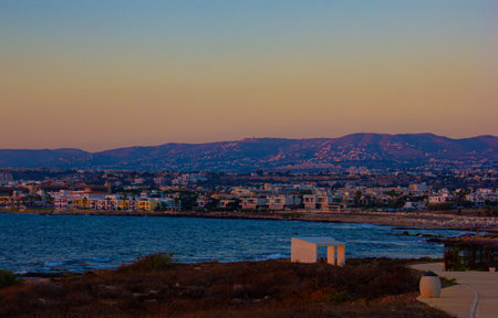 Aerial view on city under sunsetの写真素材