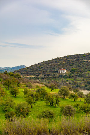 Aerial view on the house among mountains in the Cyprusの写真素材
