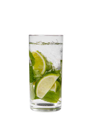 Summer drink with lime and mint, ice on isolated white background. Direct perspective, cool, refreshingの写真素材