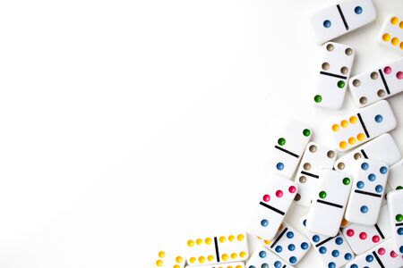 Board game dominoes, children's game, on a white background, isolate. Domino effect shot. business concept, strategy of successの写真素材