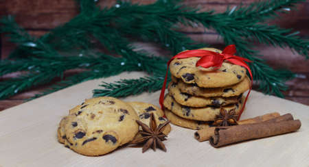 New Year's holiday biscuits with chocolate pieces and a red bow