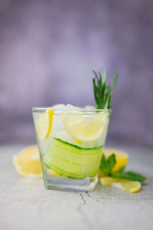 cocktail drink alcoholic with green cucumber and tonic with limeの写真素材