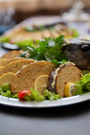 stuffed fish pike dish on the festive tableの写真素材