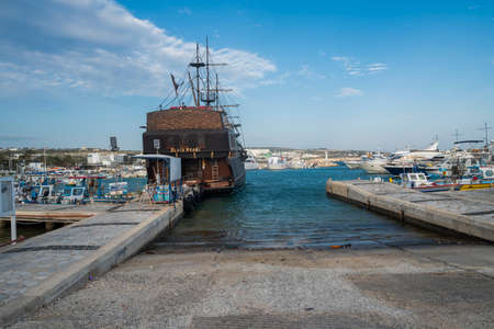 August 13, 2020. Cyprus Ayia Napa. embankment on the sea with boats in the city for fishermenのeditorial素材