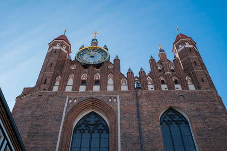 Facade of the old Bazylika Mariacka church in the old town in Gdansk Polandの写真素材