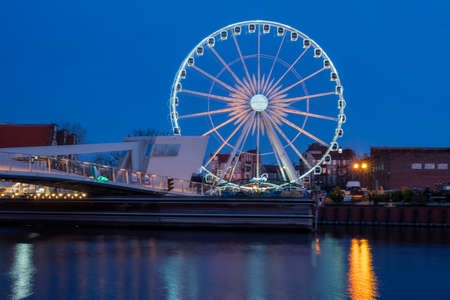 September 13, 2020, Gdansk Poland. View of the wheel overlooked on the embankment at nightのeditorial素材