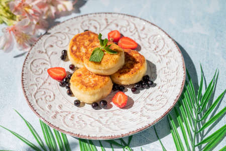 cheesecakes for breakfast with berries in a restaurant