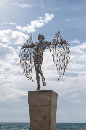 Icarus statue on the promenade near the sea in Ayia Napa Cyprusの写真素材