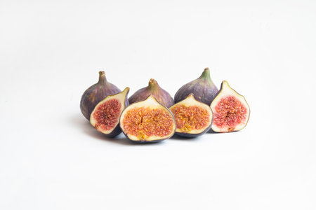 delicious sweet sliced â€‹â€‹fig fruit isolated on white background