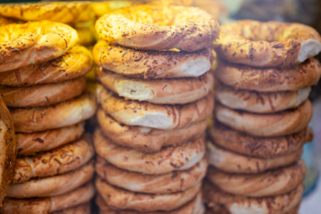 delicious traditional national Polish food obwarzanek krakowski bagel at the Christmas fairの写真素材