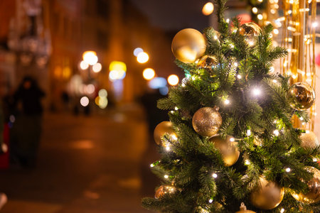 Banner of a decorated Christmas tree with decorations and bokeh for Christmas and New Yearの写真素材