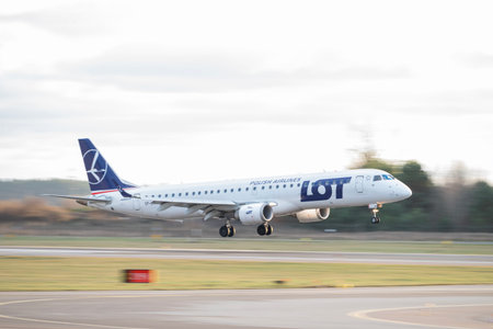 Gdansk, Poland, 28 december 2025, a plane landing on the runway at Lot Airlines Airport