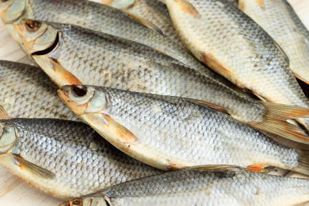 background of dry salted fish .roach lot view from above.の写真素材