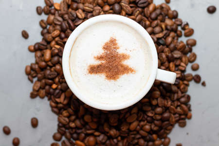 one cup of coffee cappuccino with herringbone on a concrete background with copy spaceの写真素材