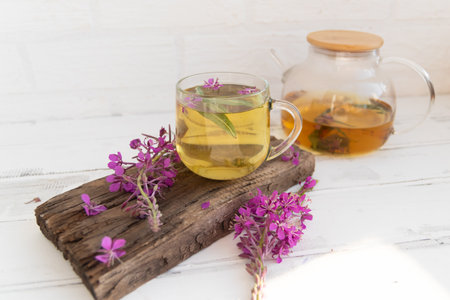 Healthy herbal tea made from cypress. Ivan tea in a mug, alternative medicine. Medicinal tinctureの写真素材