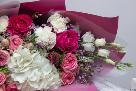 pink paper for wrapping gifts and goods.colored paper for bouquets.wrapping paper and pink ribbon for floristry.gift wrapping paperの写真素材