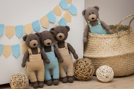 Knitted handmade toys.Crocheted yarn and wool toys.Teddy bears from yarn. Handmade toys for children.の写真素材
