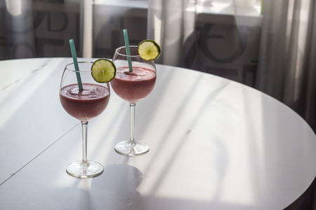 Fresh strawberry party coctails with limeの写真素材