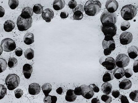 Black bubbles, circles and splashes. Black and white background. Bw. Sprayの写真素材