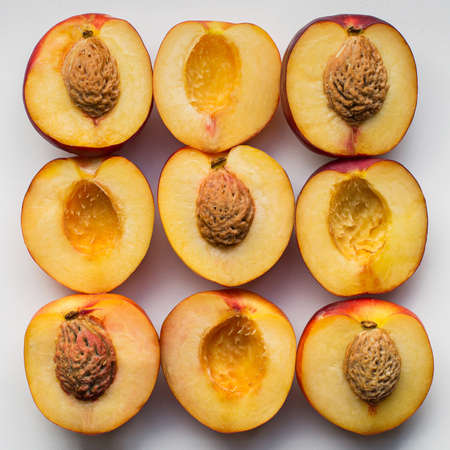 Healthy food, background. Slices of fresh nectarines.