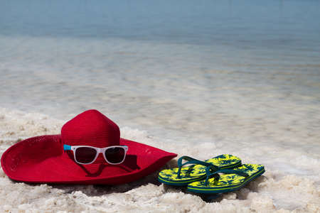 View of Dead Sea coastline. Slippers on the shoreの写真素材