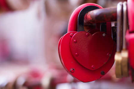 old padlocks on blurred backgroundの写真素材