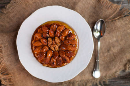 Almonds tart on wooden table background. Close upの写真素材