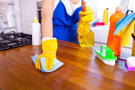 Beautiful young woman makes cleaning the house. Girl cleaning kitchen. Set.