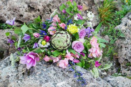 Rustic Wedding bouquet of colorful flowers and succulent on stones. bouquet for bride. Close-upの写真素材
