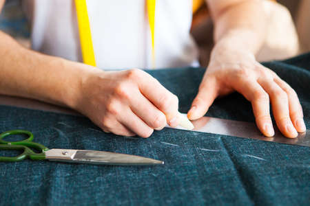 Tailor man working in his tailor shop, Tailoring, close upの写真素材