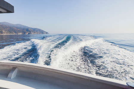 Sea and mountain views from the yacht. Cinque Terre, Italy, Ligurian Sea, summertimeの写真素材