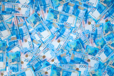 Background of money Russian banknotes currency rouble. in nominal value of two thousand. New tickets bank Russia. Close up. Rich conceptの写真素材
