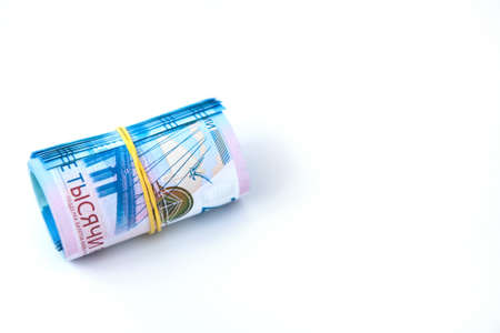 Russian money banknotes currency rouble on white isolated background. in nominal value of two thousand. New tickets bank Russia. Close up. Rich conceptの写真素材