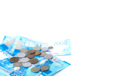 Russian money banknotes currency rouble on white isolated background. in nominal value of two thousand. New tickets bank Russia. Close up. Rich conceptの写真素材