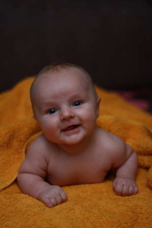 little cute baby boy newborn infant close upの写真素材