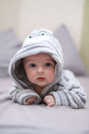 little cute baby boy newborn infant close upの写真素材
