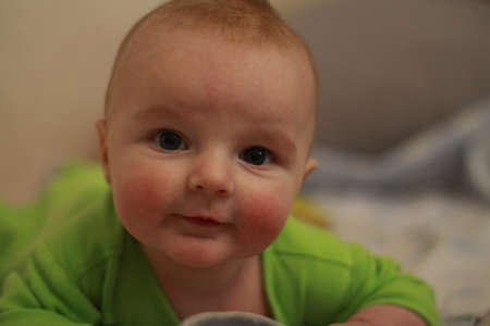 little cute baby boy newborn infant close upの写真素材