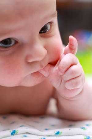 hand of a newborn baby close up. folds baby handの写真素材