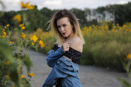 girl in retro style. old dress, style and hairstyle. curly hair, bright makeup.の写真素材