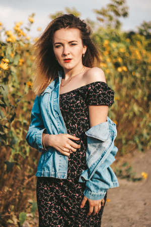 girl in retro style. old dress, style and hairstyle. curly hair, bright makeup.の写真素材