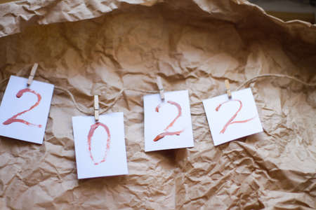 numbers 2022 are drawn in brown paint. two thousand twenty-second year, new year. Flat lay Top viewの写真素材