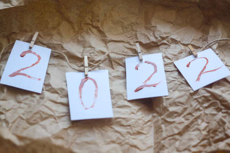 numbers 2022 are drawn in brown paint. two thousand twenty-second year, new year. Flat lay Top viewの写真素材
