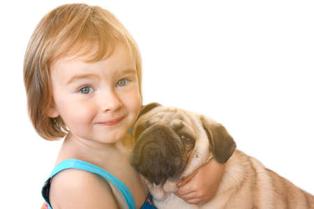 Little girl and the Pug-dog isolated on a white backgroundの写真素材