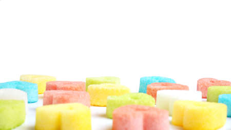 Colorful valentine hearts candy on white background.  Sweets hearts. Valentineâs day symbol. Festive treat. Valentine day background.の写真素材
