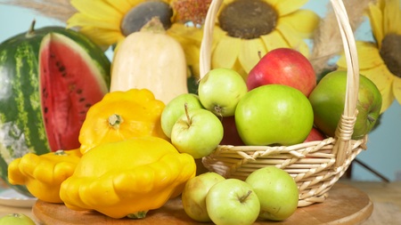 colorful still-life on a colored background. Pumpkin, squash, apples. Autumn harvest.の写真素材