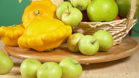 colorful still-life on a colored background. Pumpkin, squash, apples. Autumn harvestの写真素材